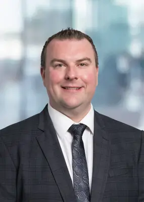 Man in suit smiling