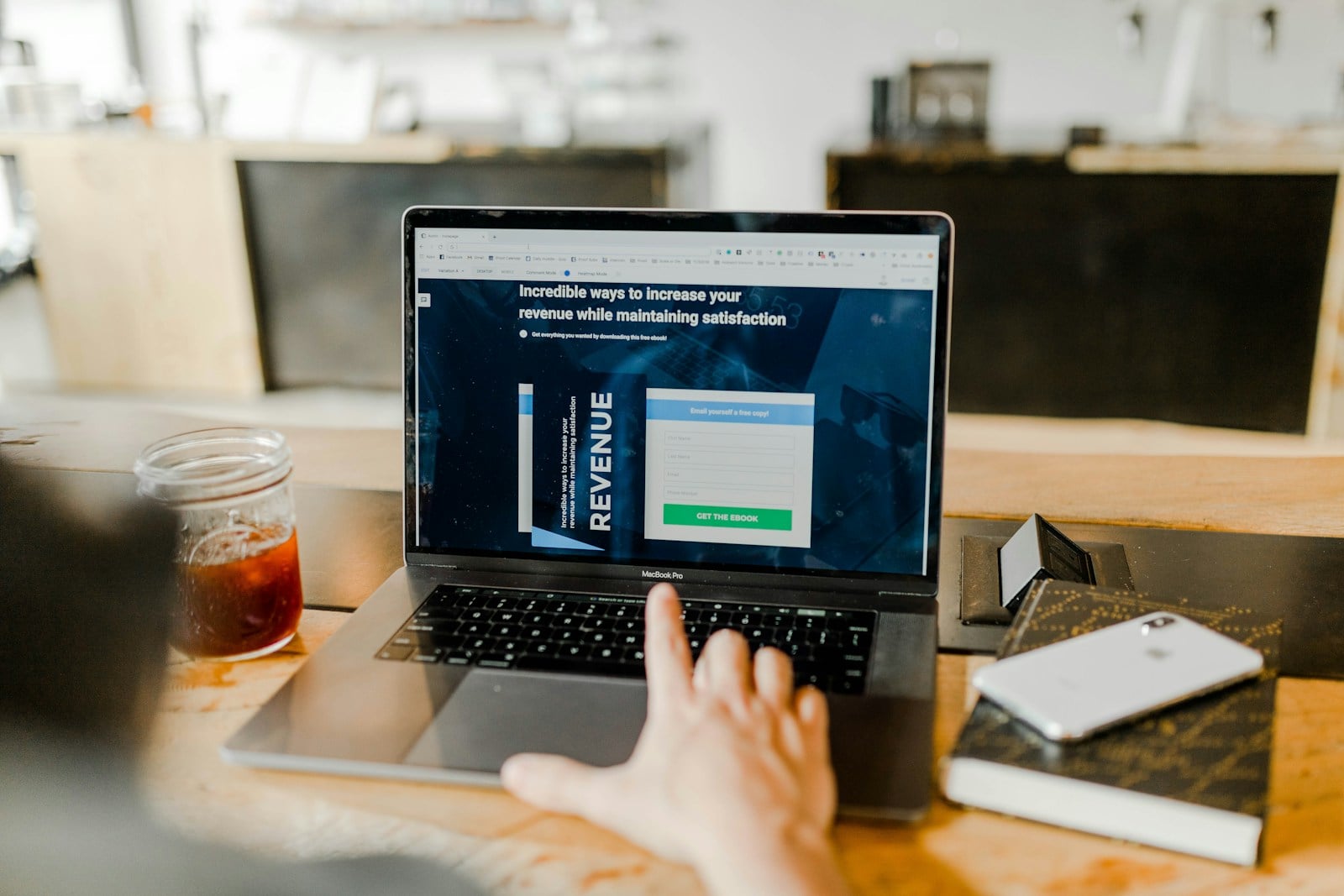 Laptop screen displaying revenue dashboard